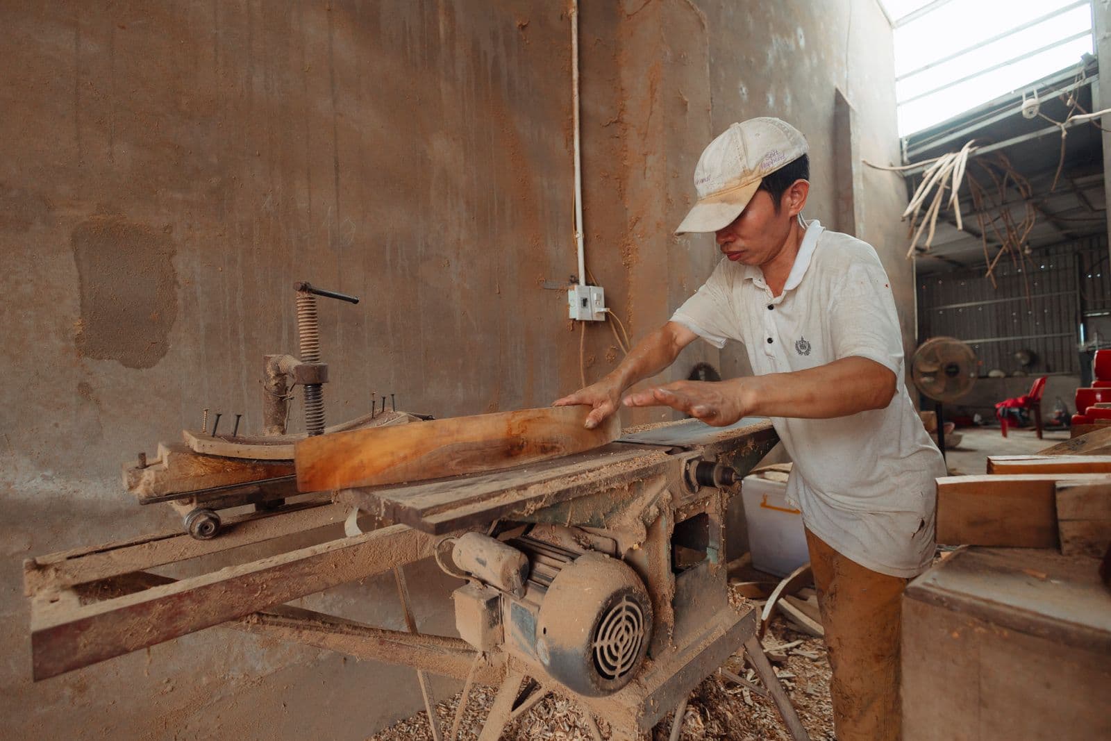 Carpenter at an industrial saw