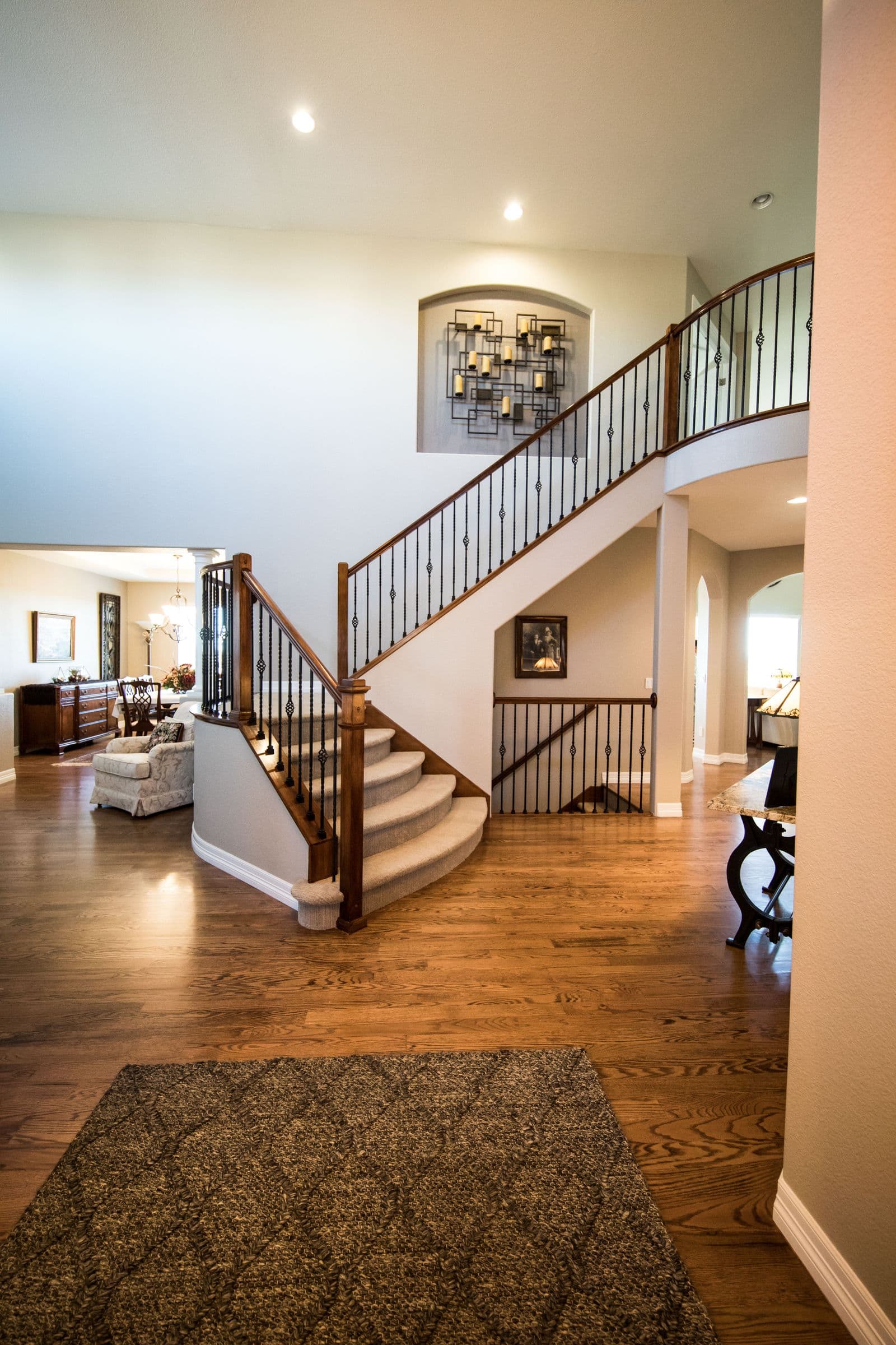 Staircase area with natural wood treads