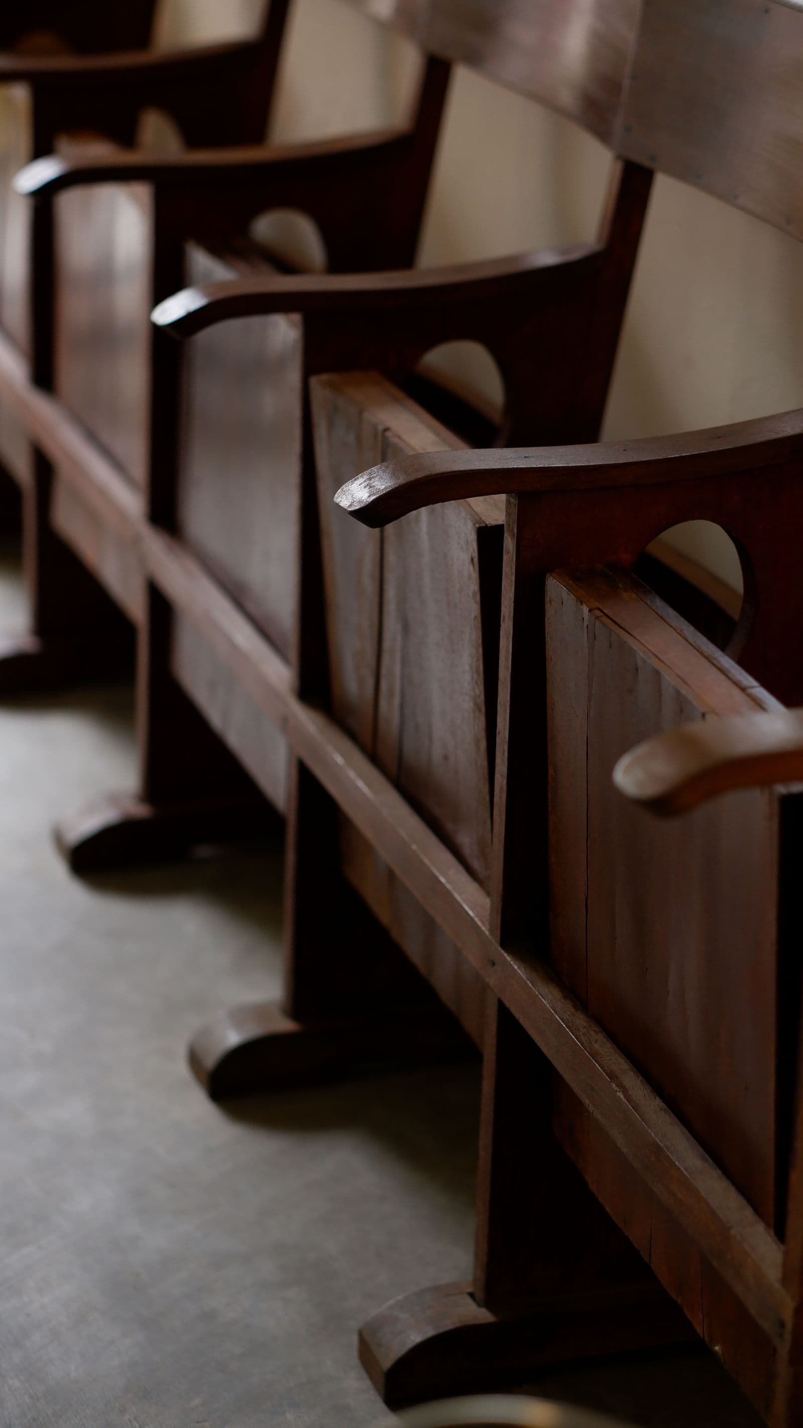 Row of vintage wooden church benches