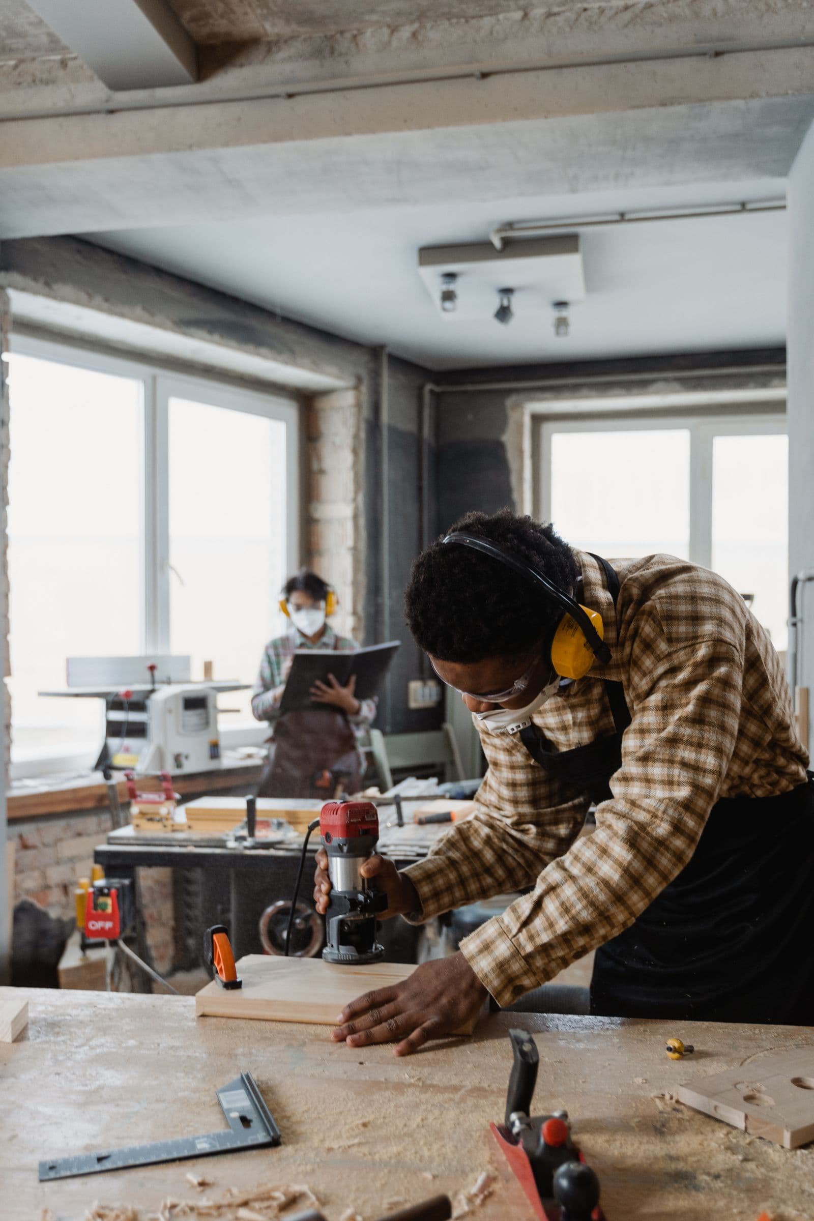 Carpenter working on a piece of wood